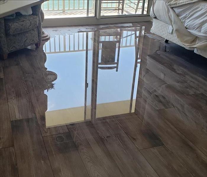 Bedroom floor with standing water