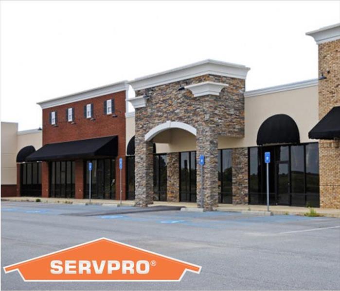 Row of Commercial Buildings with SERVPRO logo